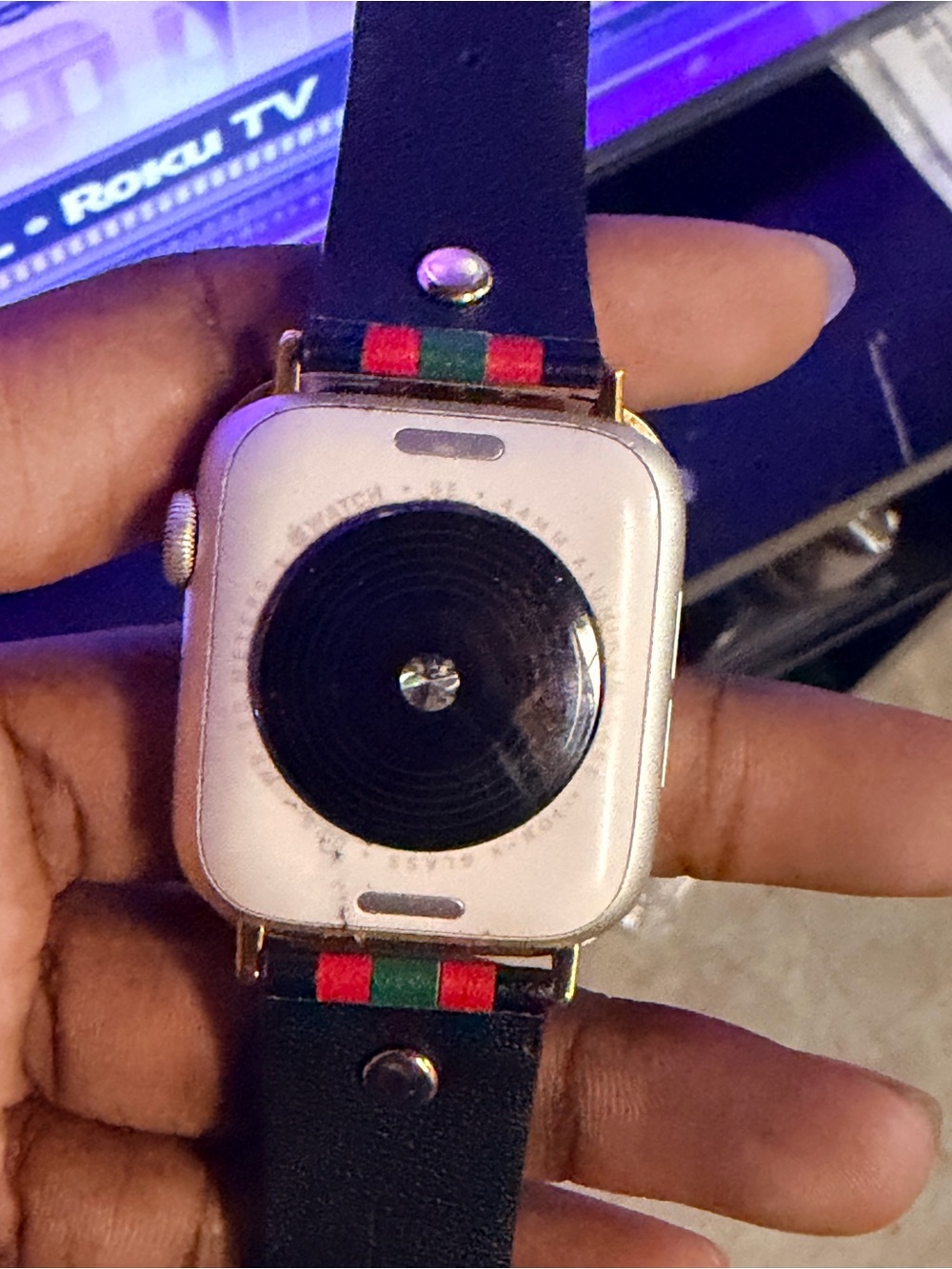 Apple Smartwatch with Black Strap and Red & Green Accents